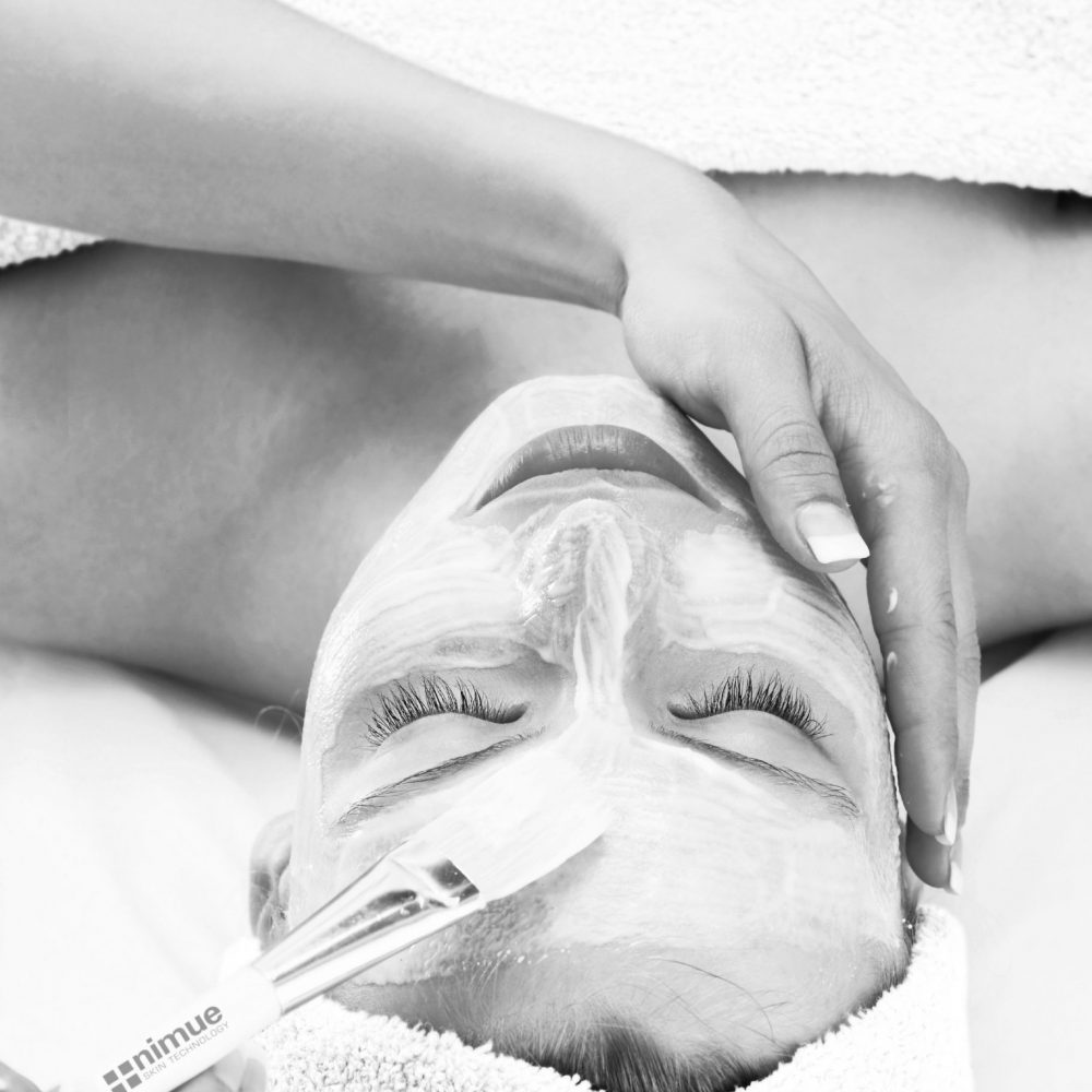 Portrait of a young girl enjoying a healthy skin treatment at a spa resort.